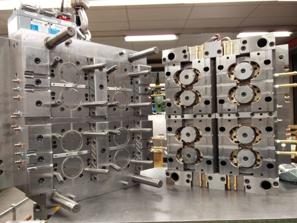 Opened eight-cavity injection mould showing both mould halves