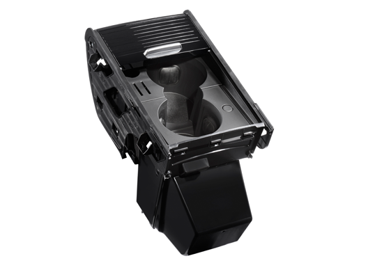 Moulded cubby box assembly with cup holder and tambour door, seen from above