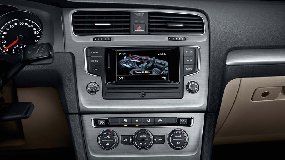 VW Golf dashboard with infotainment screen and climate control panel